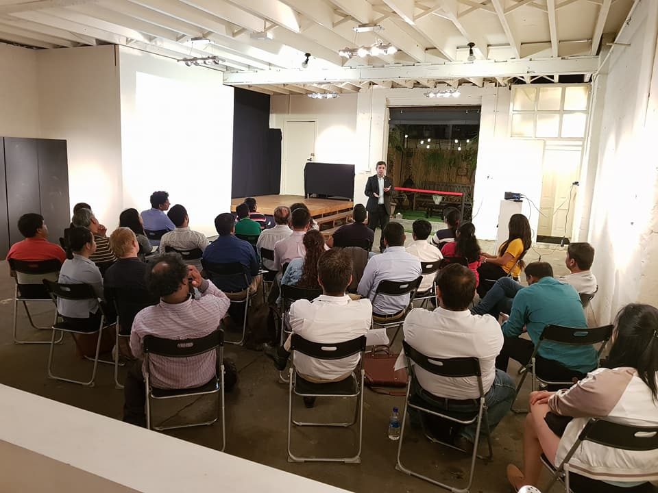 Gaurav speaking to attendees